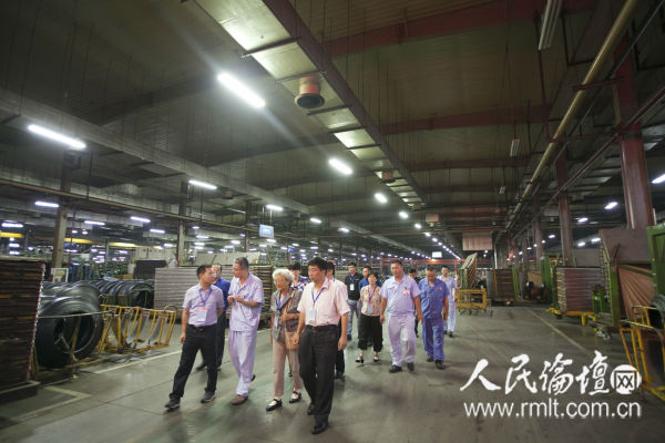 人民论坛融合党建调研组走进双钱集团